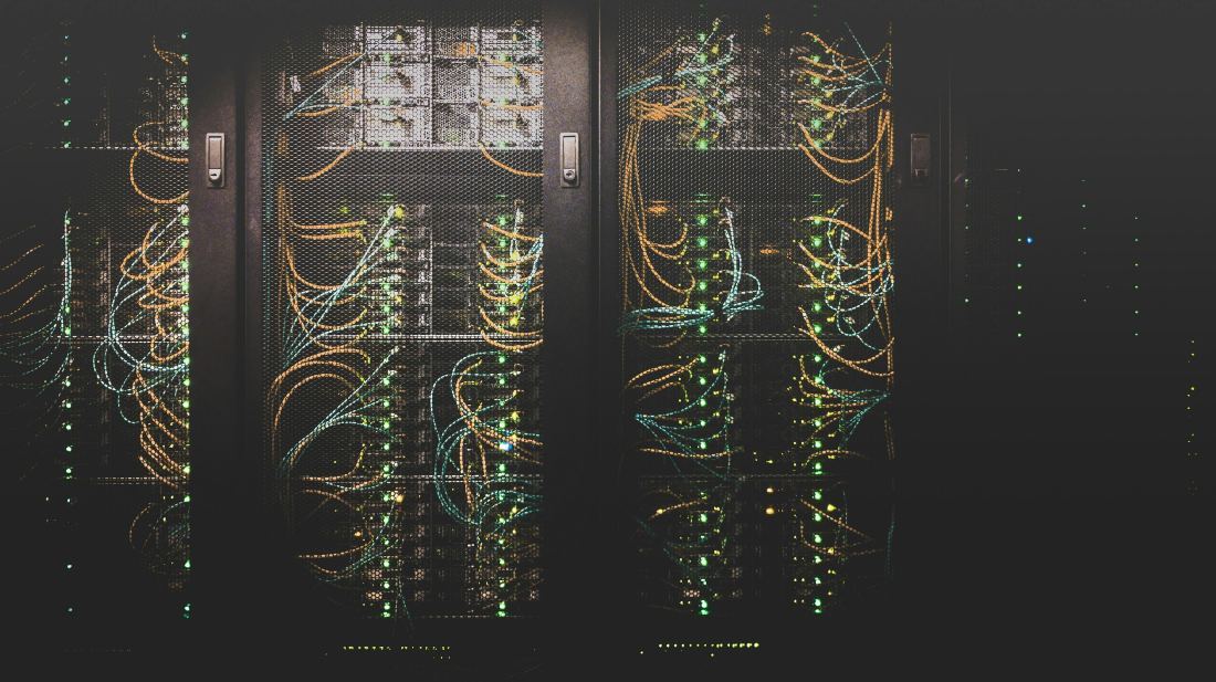 Rows of server racks with structured cabling